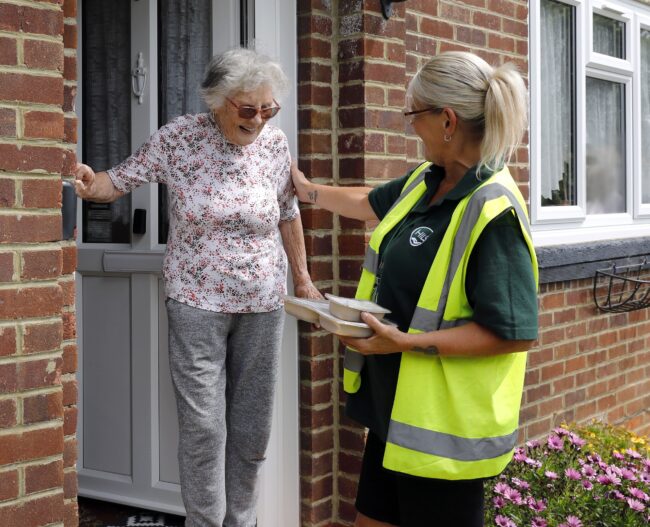 Driver delivering meal at the door